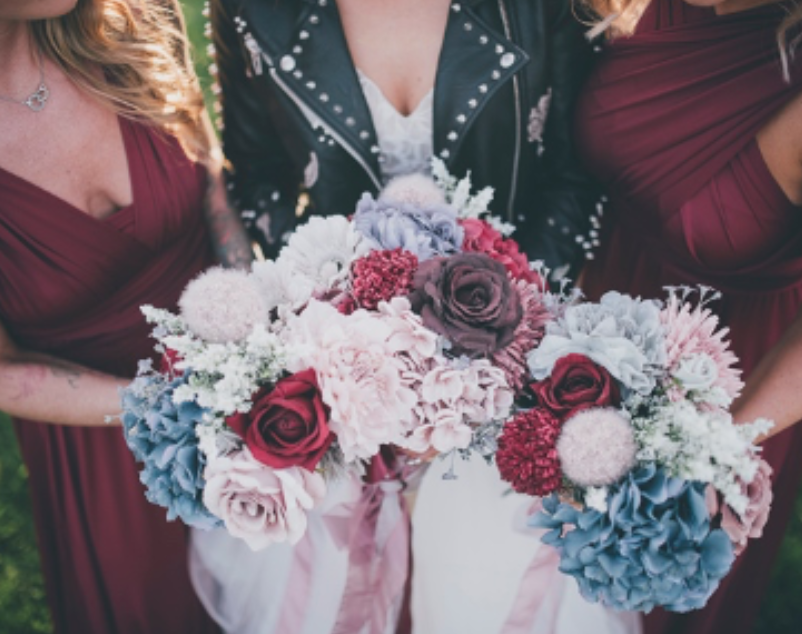 Bride and bridesmaids with their bouquet of flowers