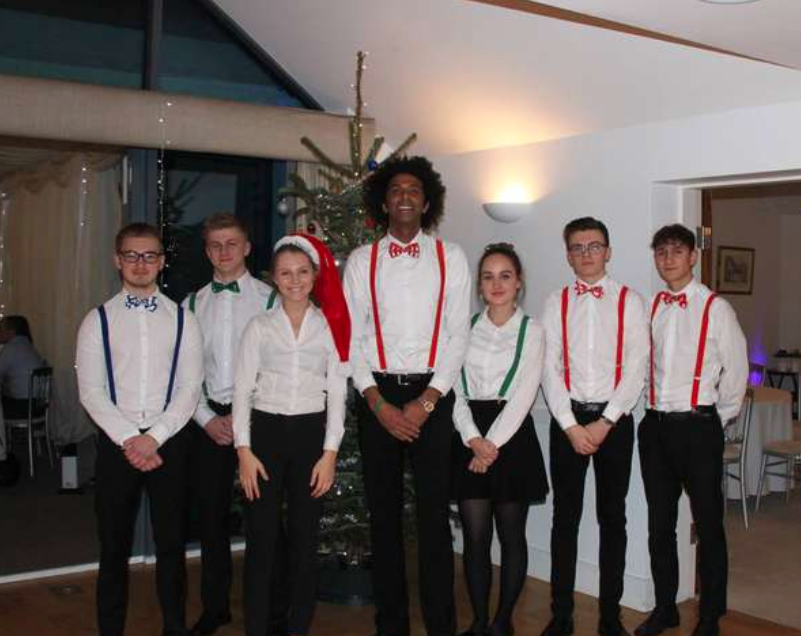 Staff at Manor Hill dressed up for a Christmas wedding