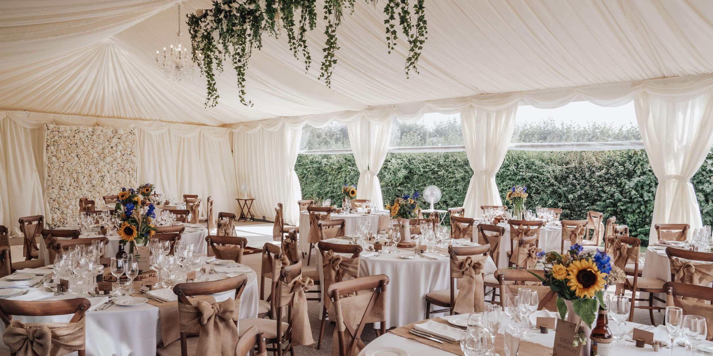 wedding breakfast set up in the marquee at Manor Hill House