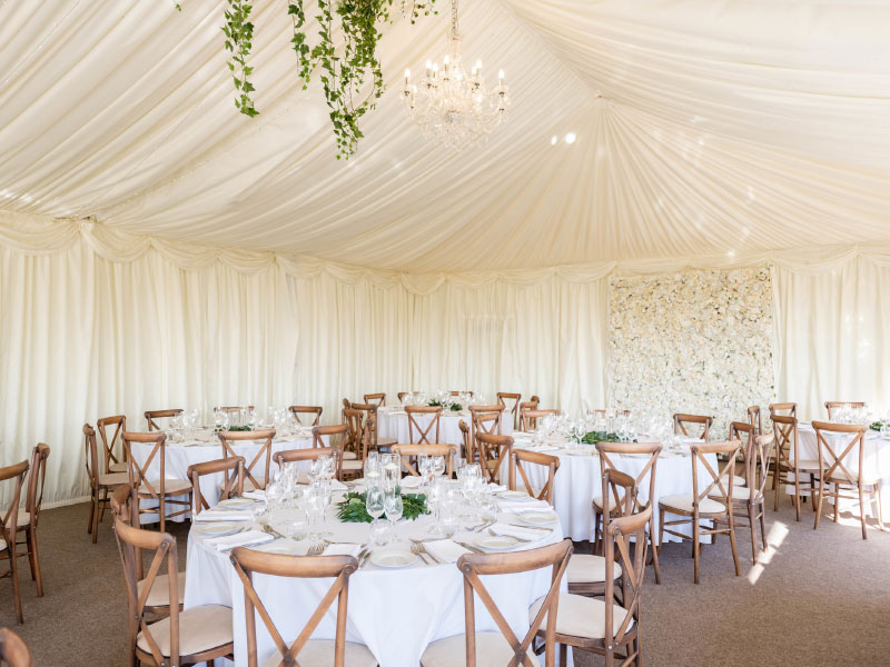 wedding breakfast set up in the marquee at Manor Hill House