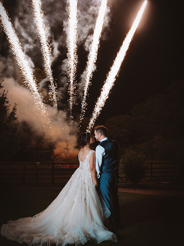 bride and groom with fireworks at Manor Hill House