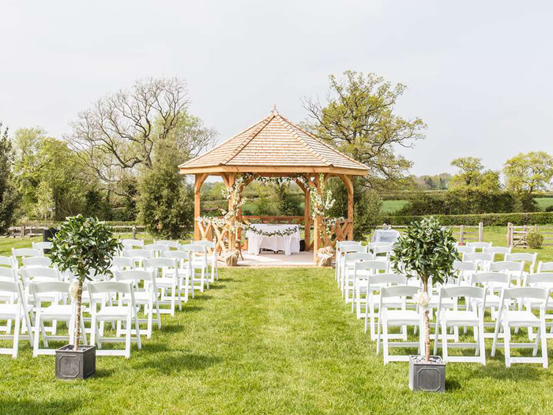 the wedding ceremony set up outdoors at Manor Hill House
