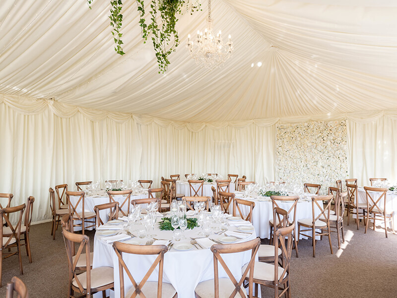 the wedding breakfast set up in the marquee