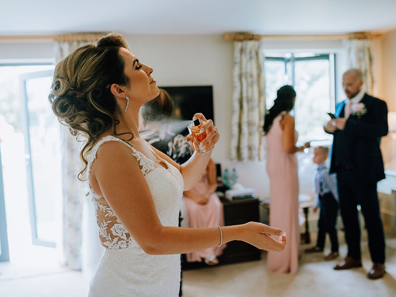 bride getting ready in the bridal suite