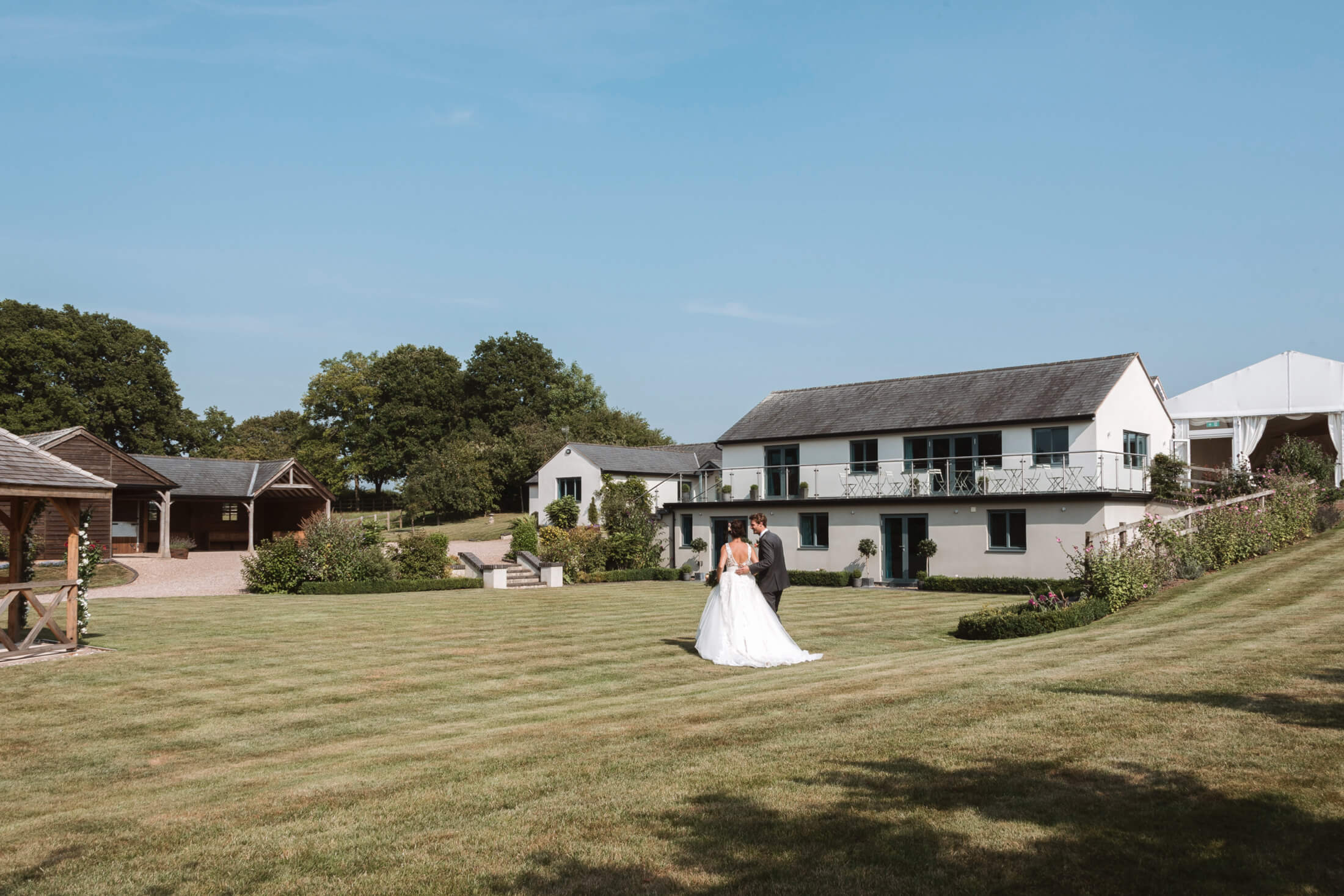 bride and groom on the lawn at Manor Hill House