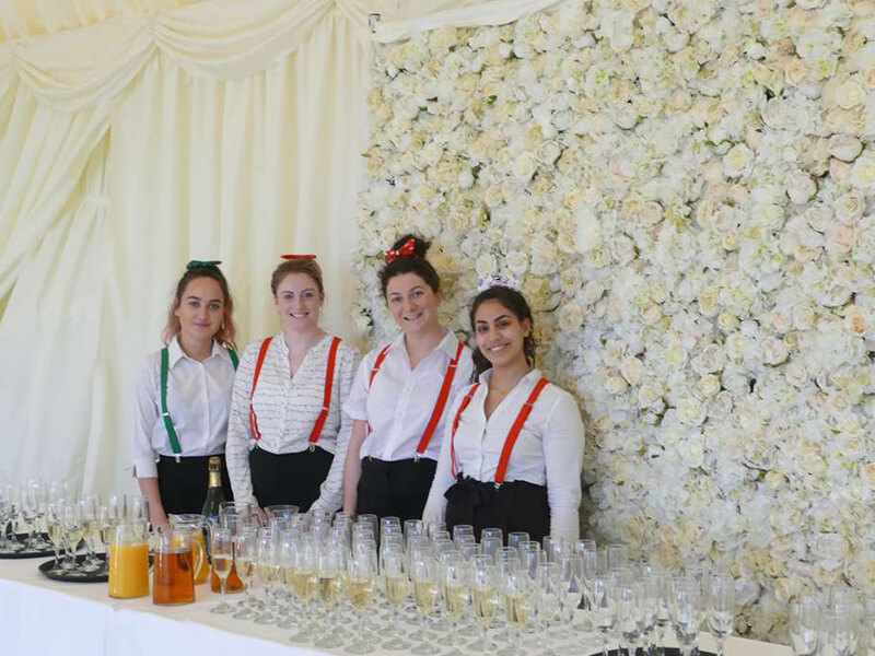staff at Manor Hill House with reception drinks