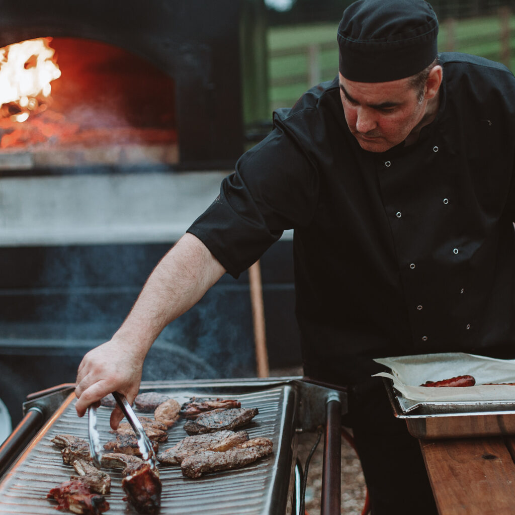 chef with BBQ for evening food