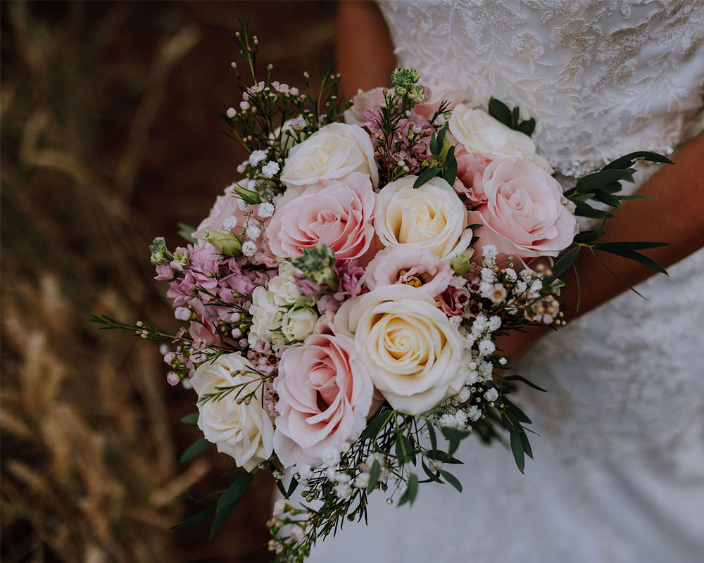 bride with floral bouquet