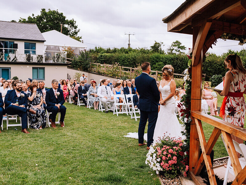 wedding ceremony on the lawn at Manor Hill House