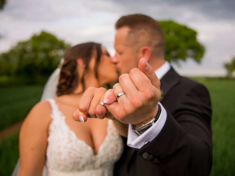 bride and groom photo showing rings