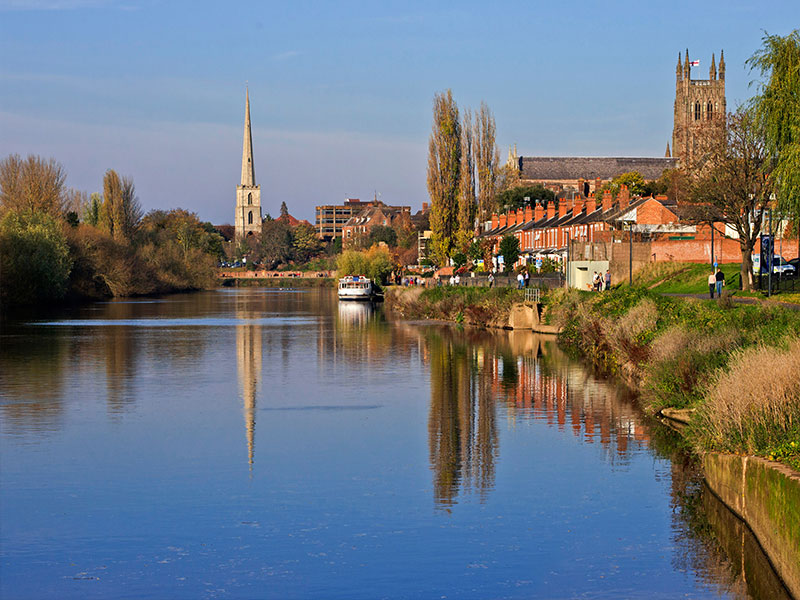 River, houses on riverbank and Worcester cathedral