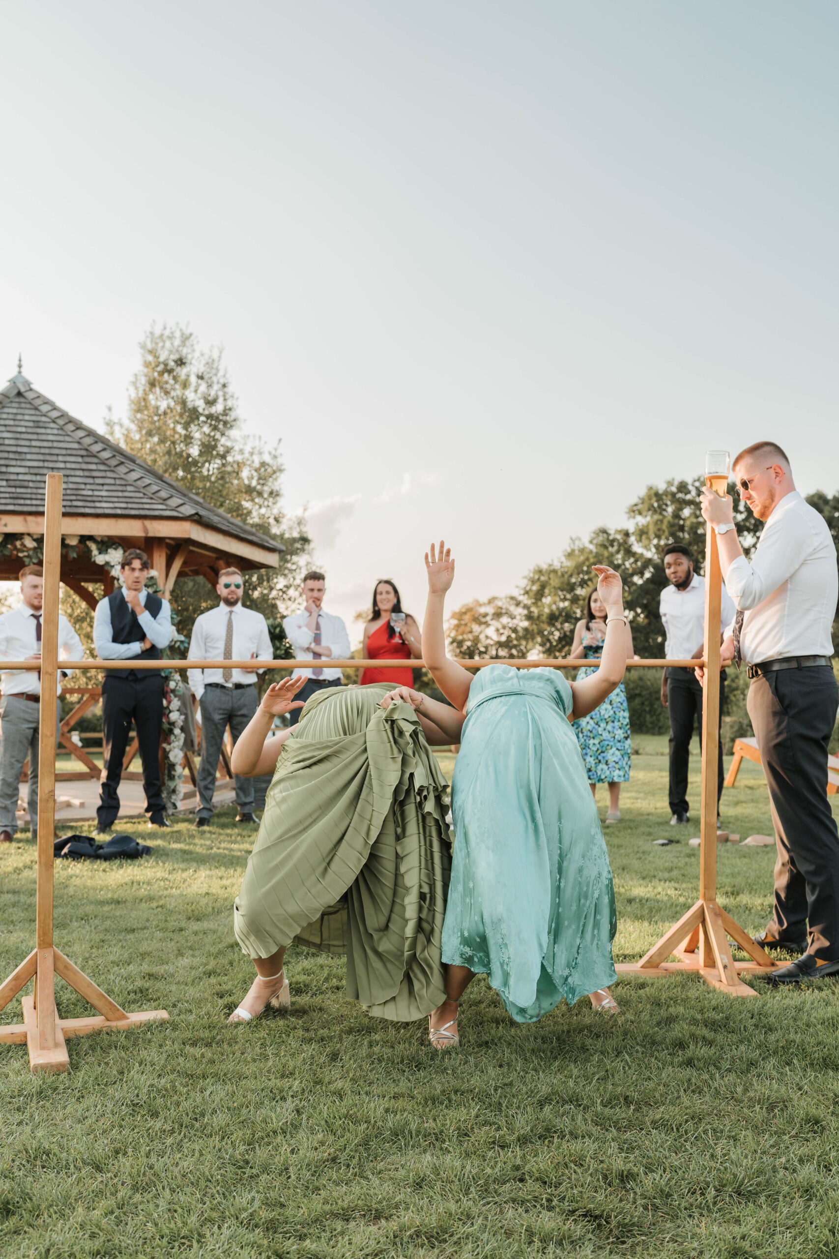 Wedding guests playing with garden games