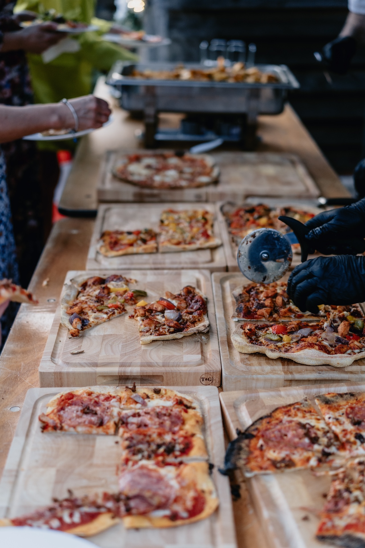 Pizza being served at a wedding