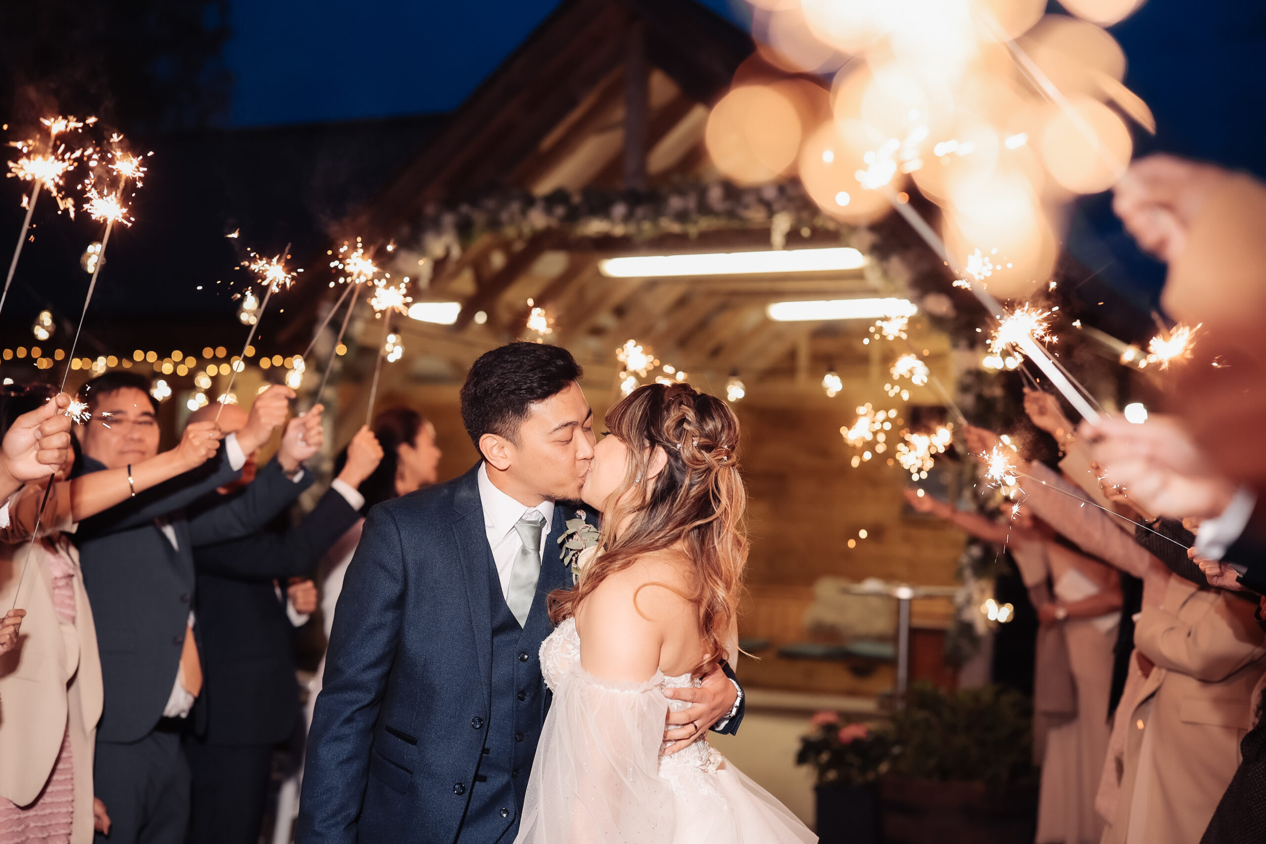 Sparkler walk through by barn