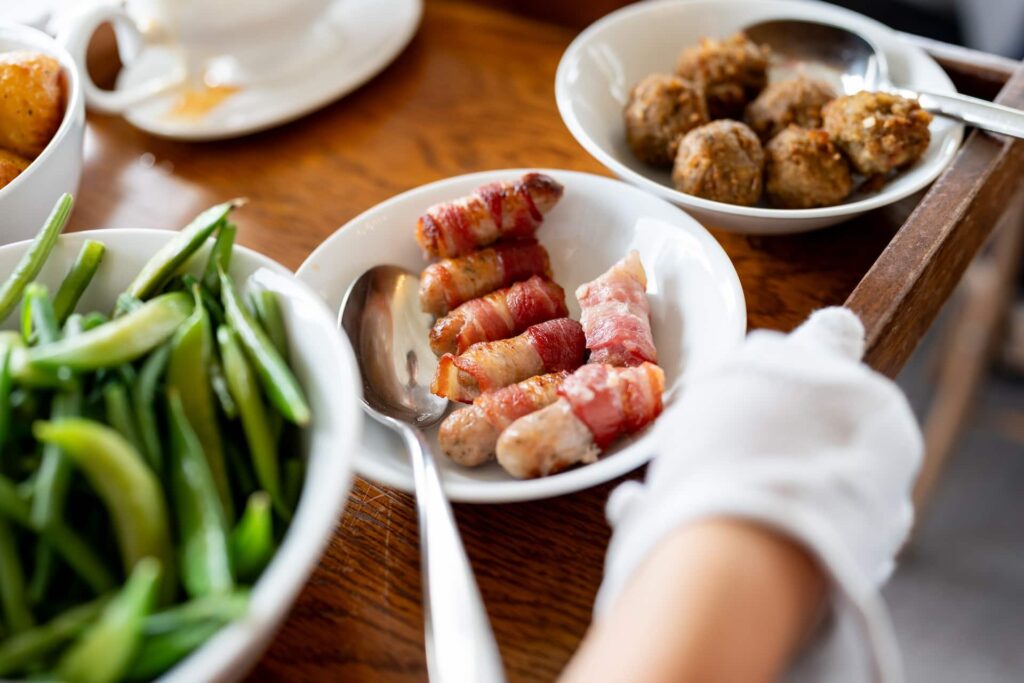 Food being served for Host with the Roast