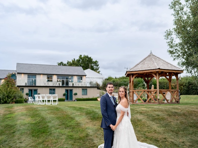 Bride and groom with the venue