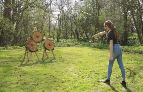 Girl-Throwing-Axe.width-500 Girl-Throwing-Axe.width-500